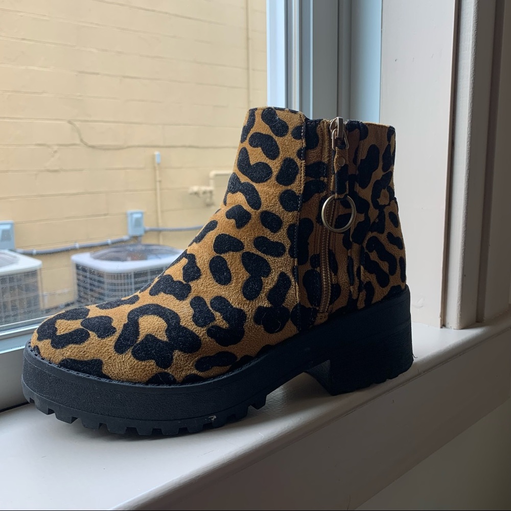 Animal print platform boots.